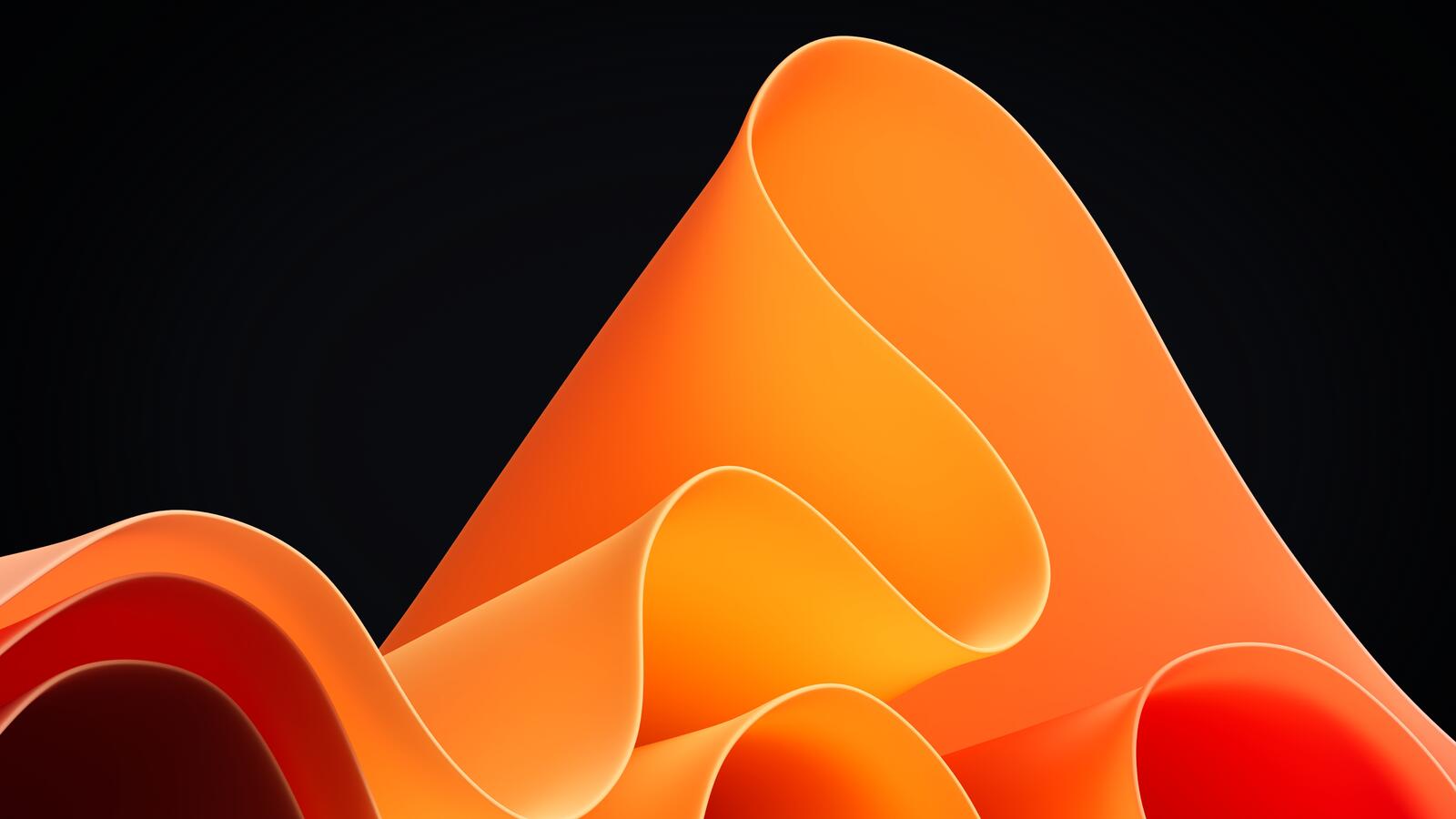 Бесплатное фото Оранжевая волнистая ткань на черном фоне