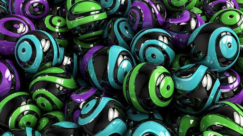 Зеленые, фиолетовые, бирюзовые шары с черными полосками