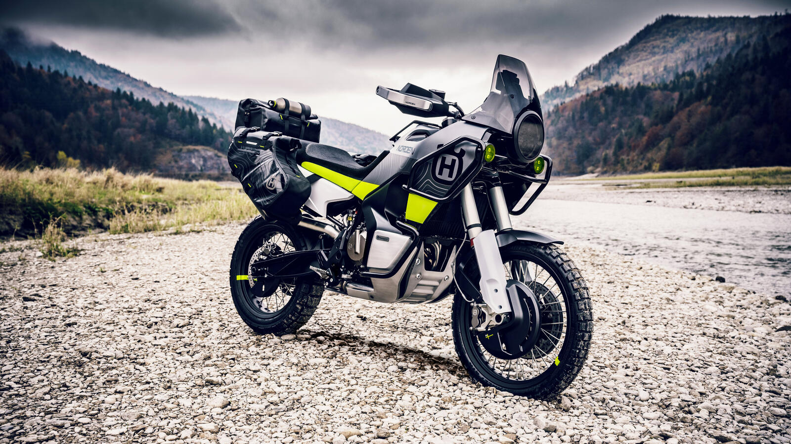 Free photo Husqvarna Norden 901 motorcycle stands in the mountains