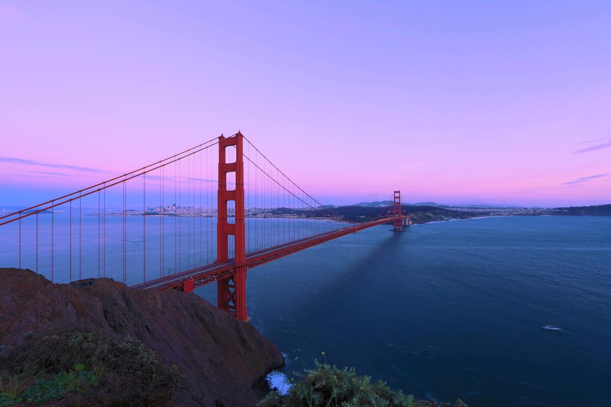 Golden Gate Bridge during the purple dawn.