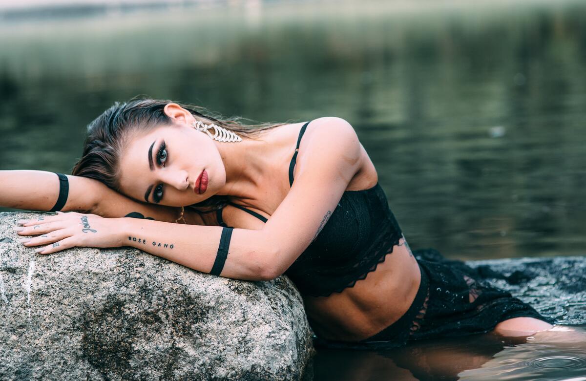 Girl posing in the river