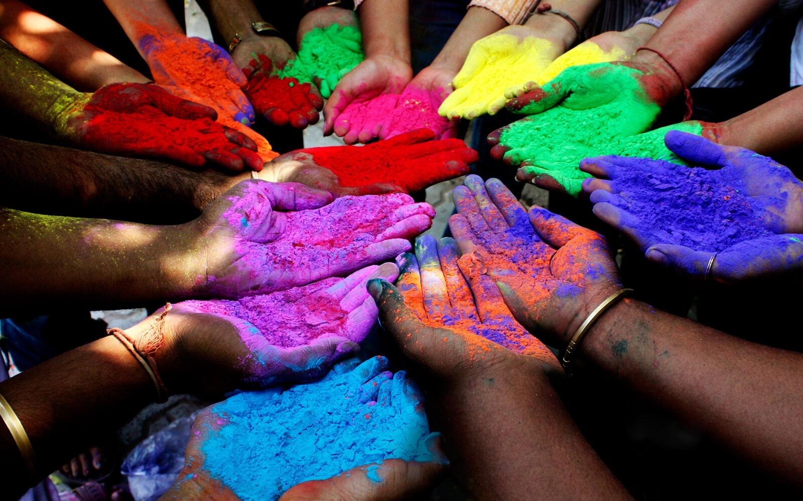 Free photo Colored dust on children`s hands