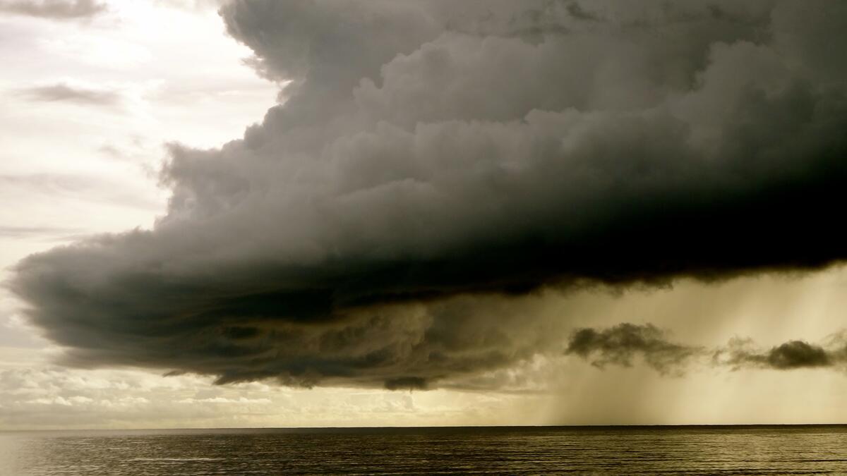 A large storm cloud over the sea