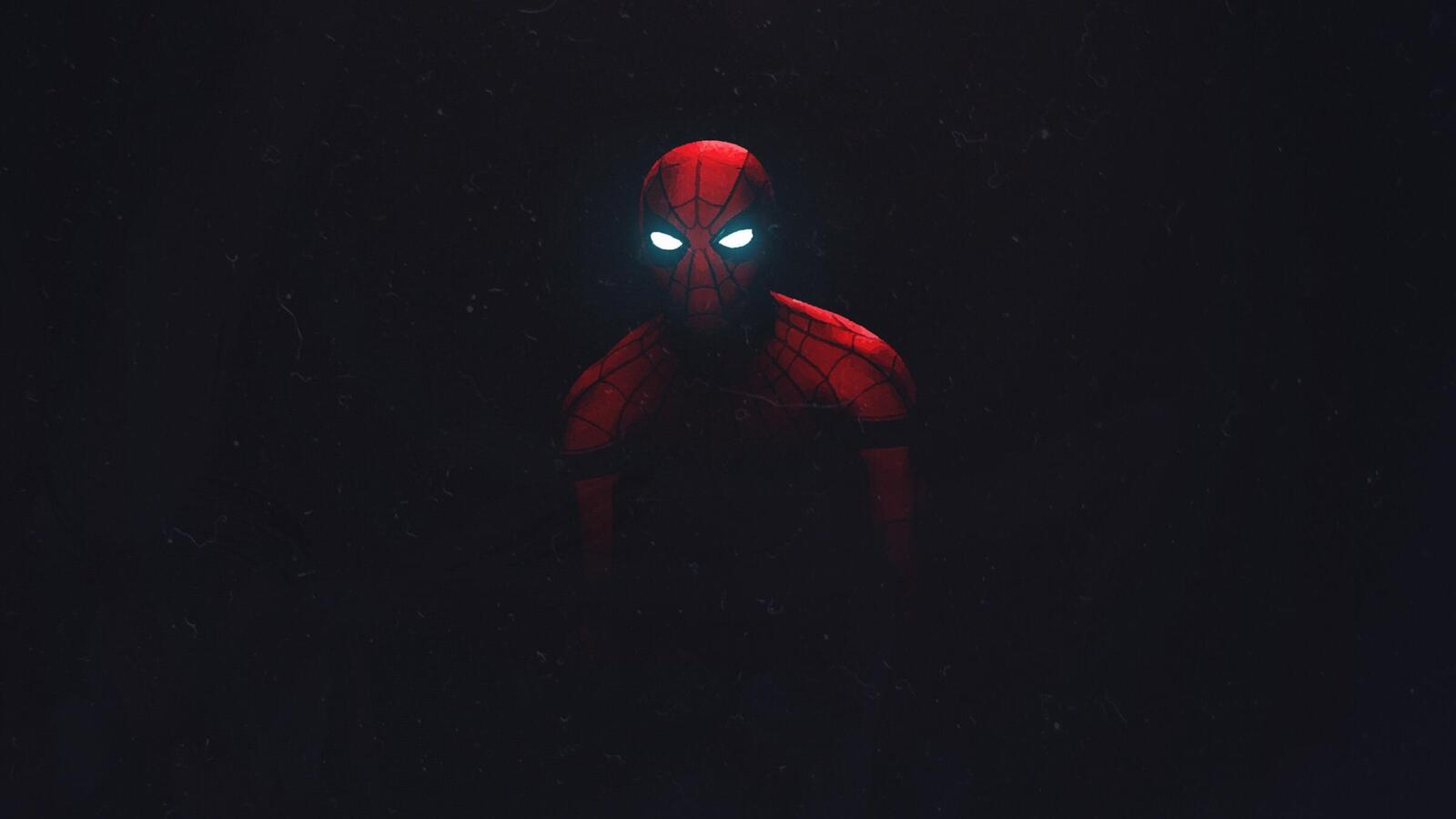 Бесплатное фото Человек паук со светящимися глазами в темноте