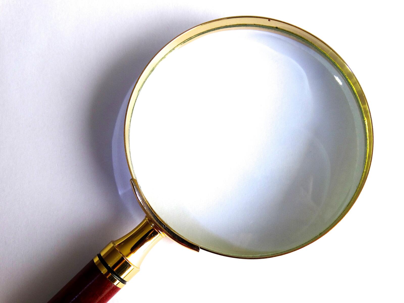 Free photo Gold magnifying glass