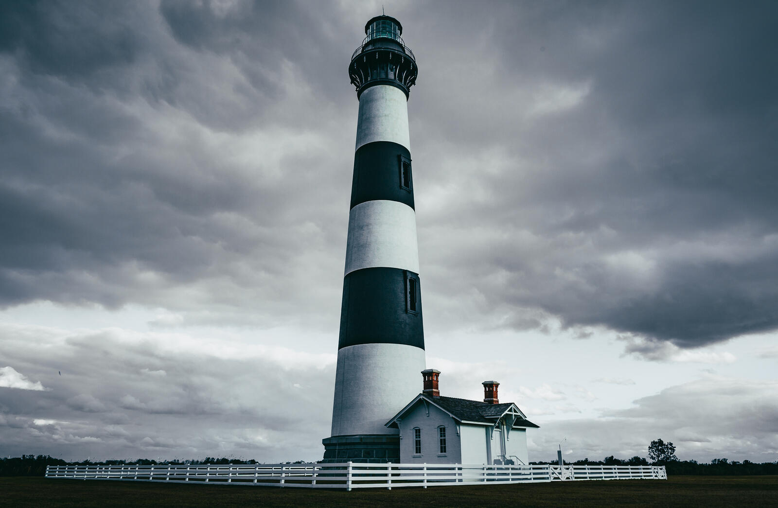 Free photo Lighthouse in black and white photo