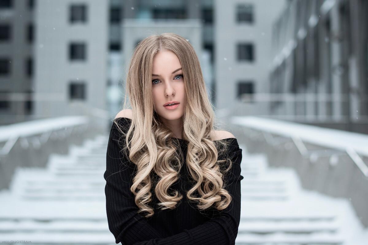 Portrait of a beautiful blonde girl with long hair