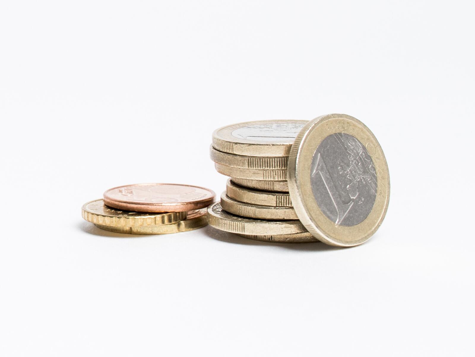 Free photo Euro coins on white background