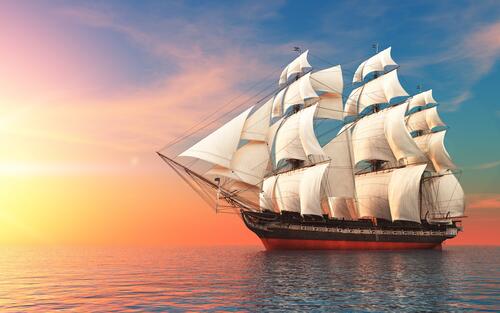 A beautiful sailing ship at sunset
