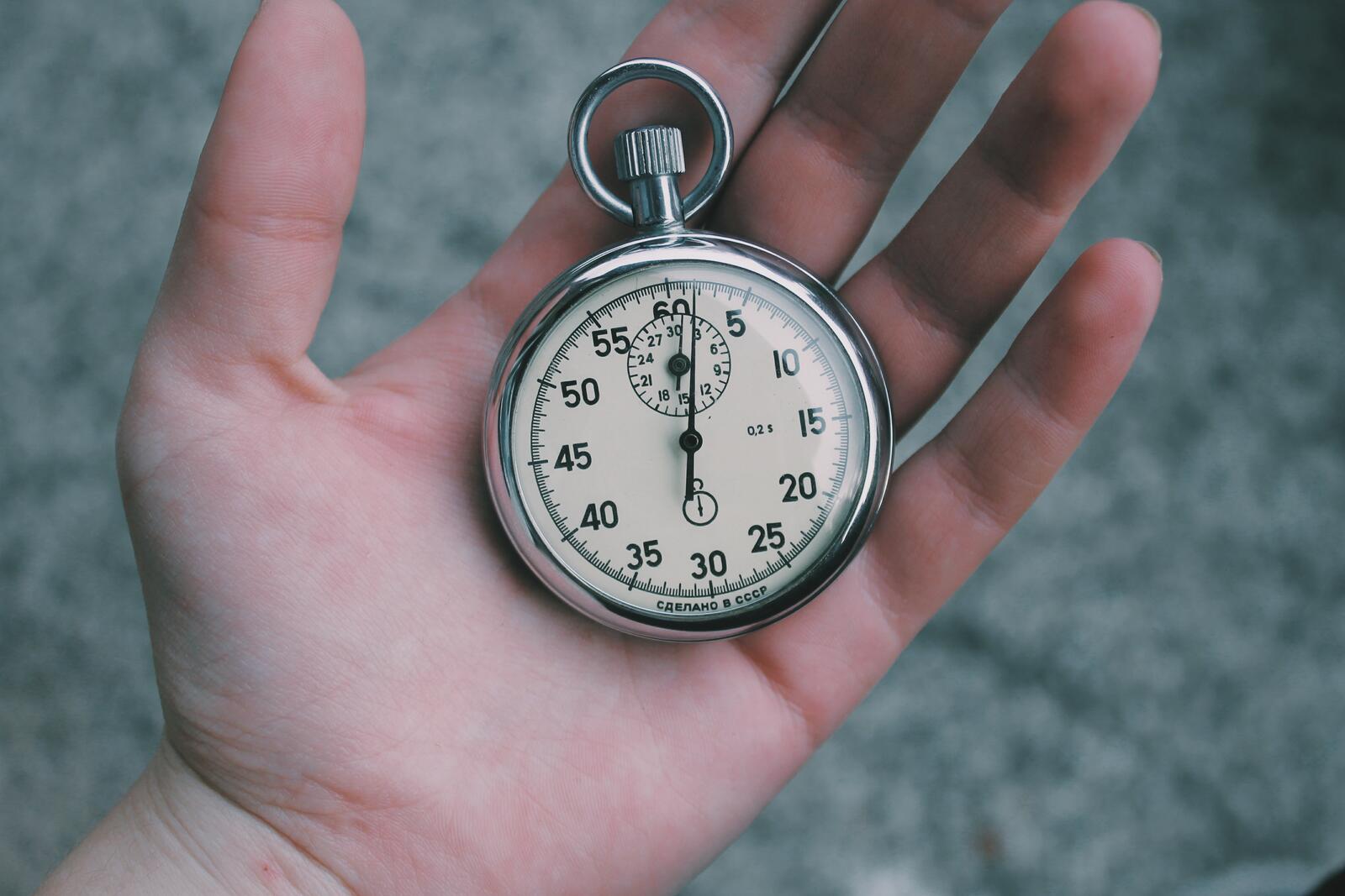 Free photo Stopwatch in hand