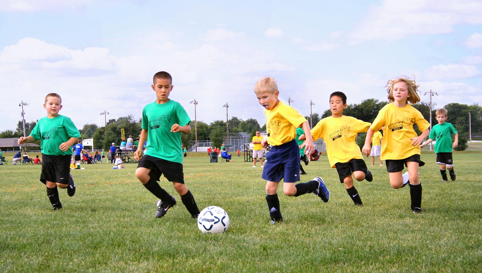 Free photo Kids play soccer