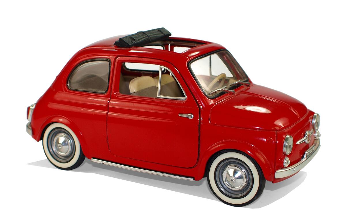 Toy model of a Fiat 500 car in red
