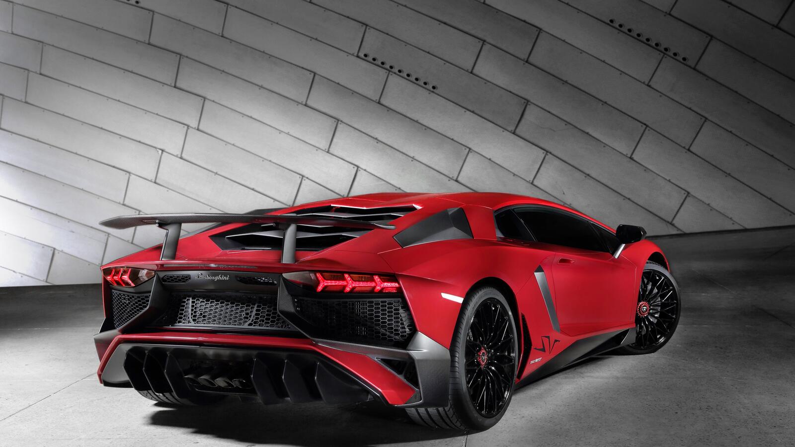 Free photo Red Lamborghini Aventador on beautiful black rims
