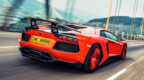 Lamborghini Aventador in orange rear view