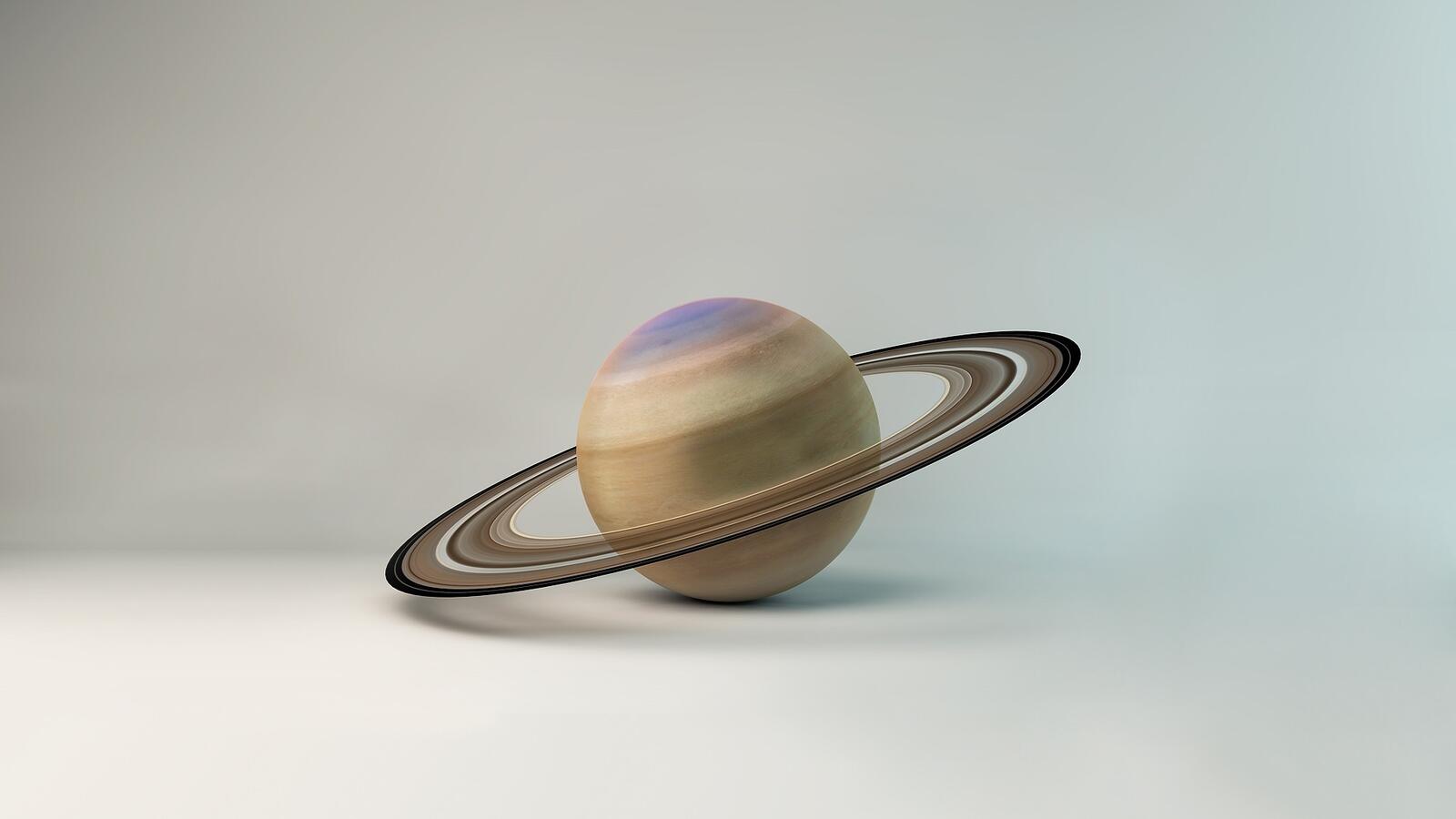 Бесплатное фото Планета с кольцами на белом фоне