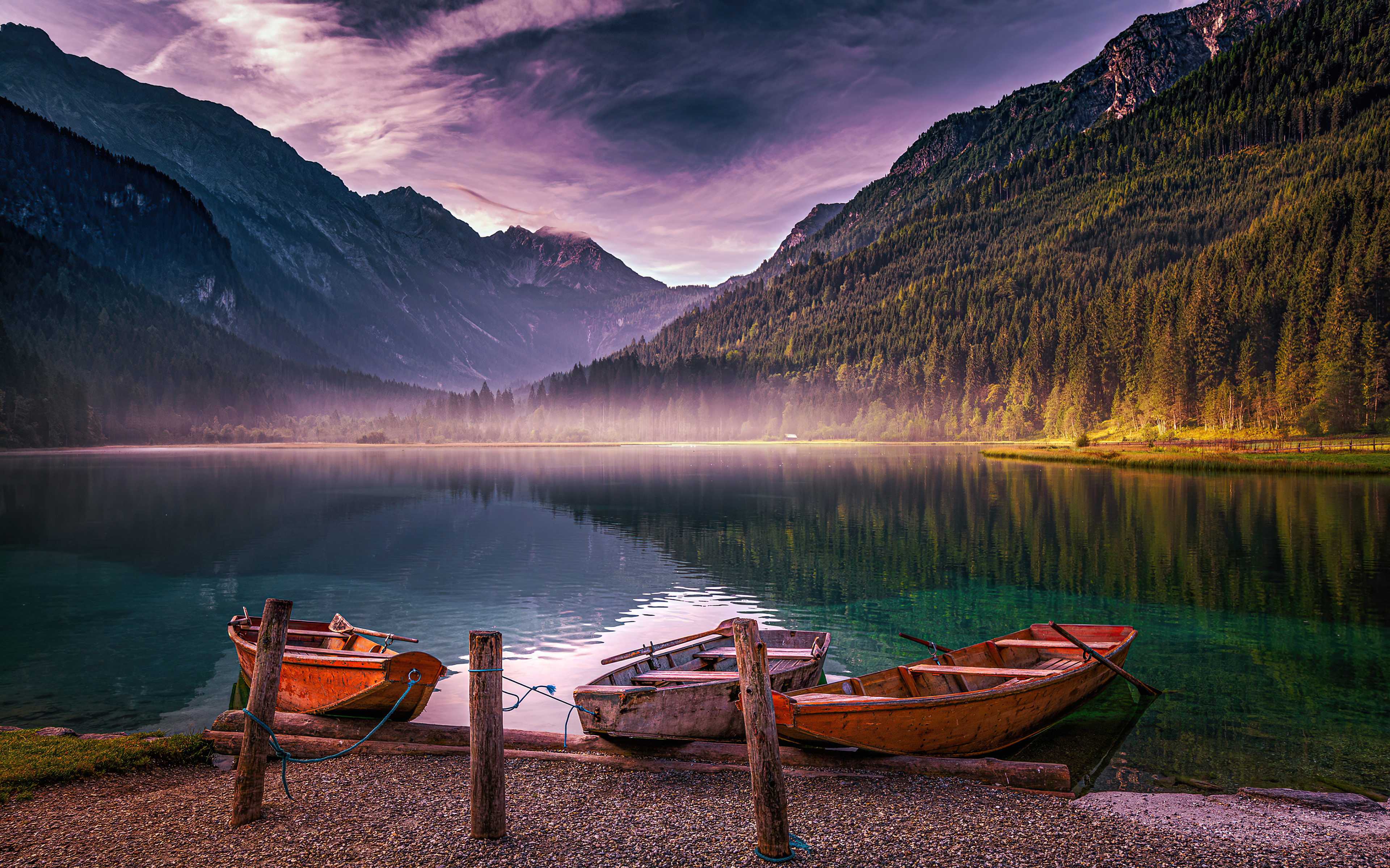 Wooden boats on the lake shore