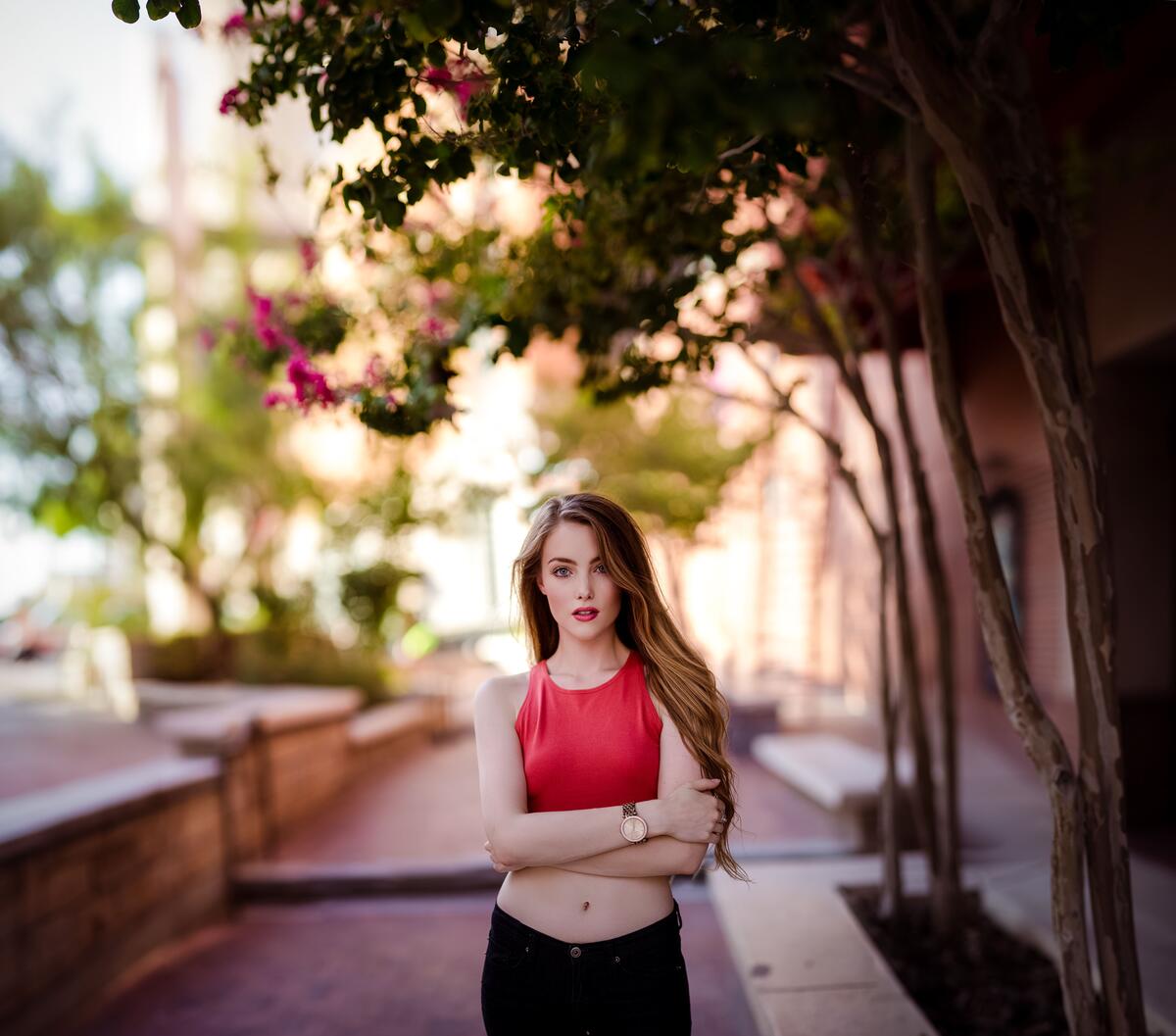 Portrait of April Alleys in a red top