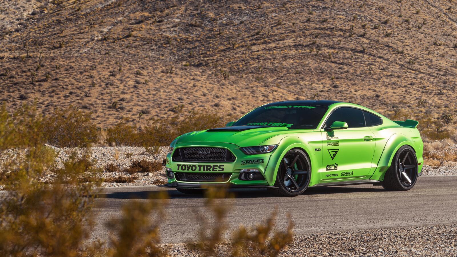 Free photo Ford Mustang in light green on black rims