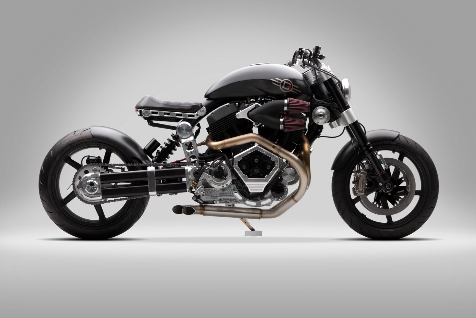Бесплатное фото Черный мотоцикл  confederate x132 hellcat на сером фоне