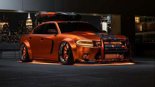 Tuned Dodge Charger with orange neon lights