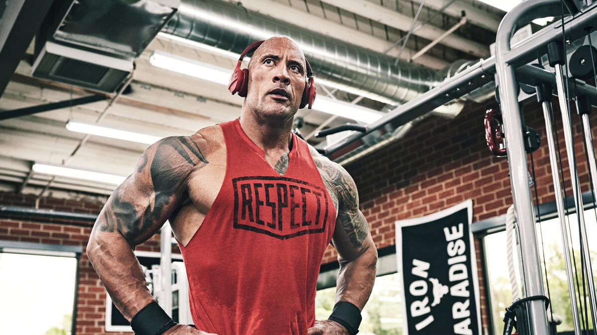 Dwayne Johnson works out at the gym