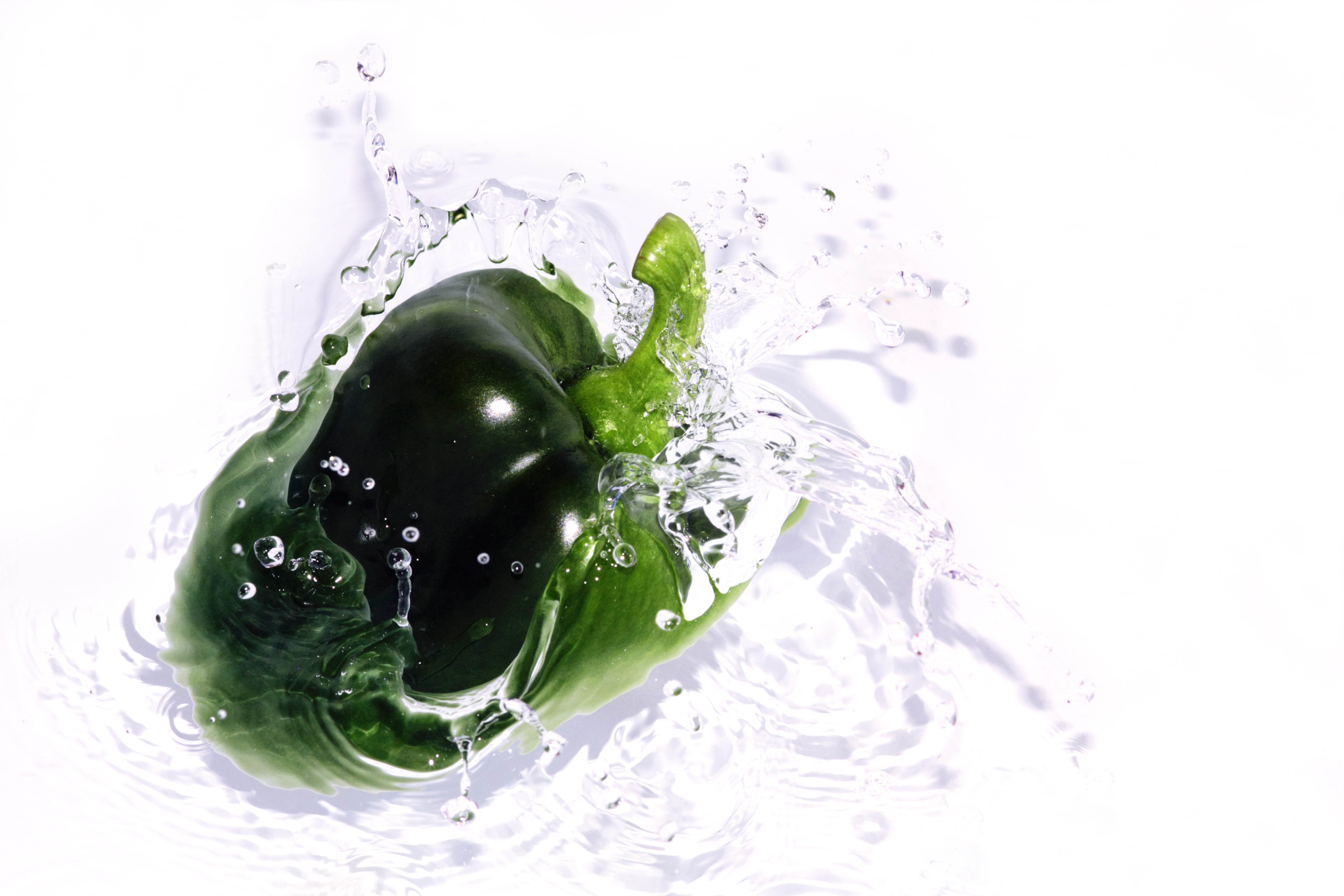 Green bell peppers in water