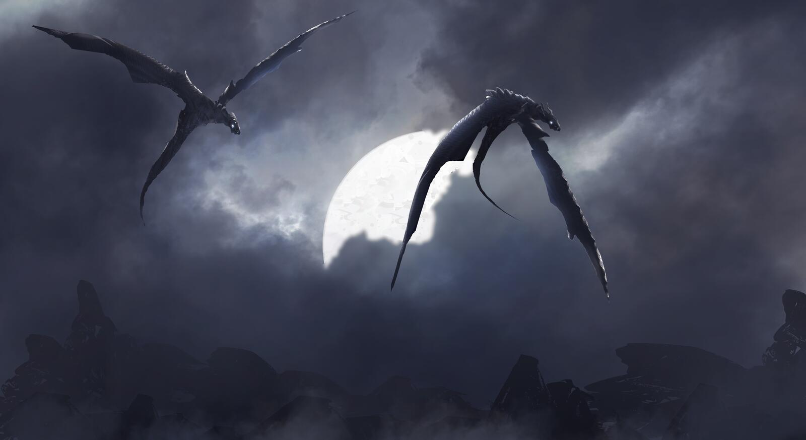 Бесплатное фото Два дракона в небе на фоне Луны