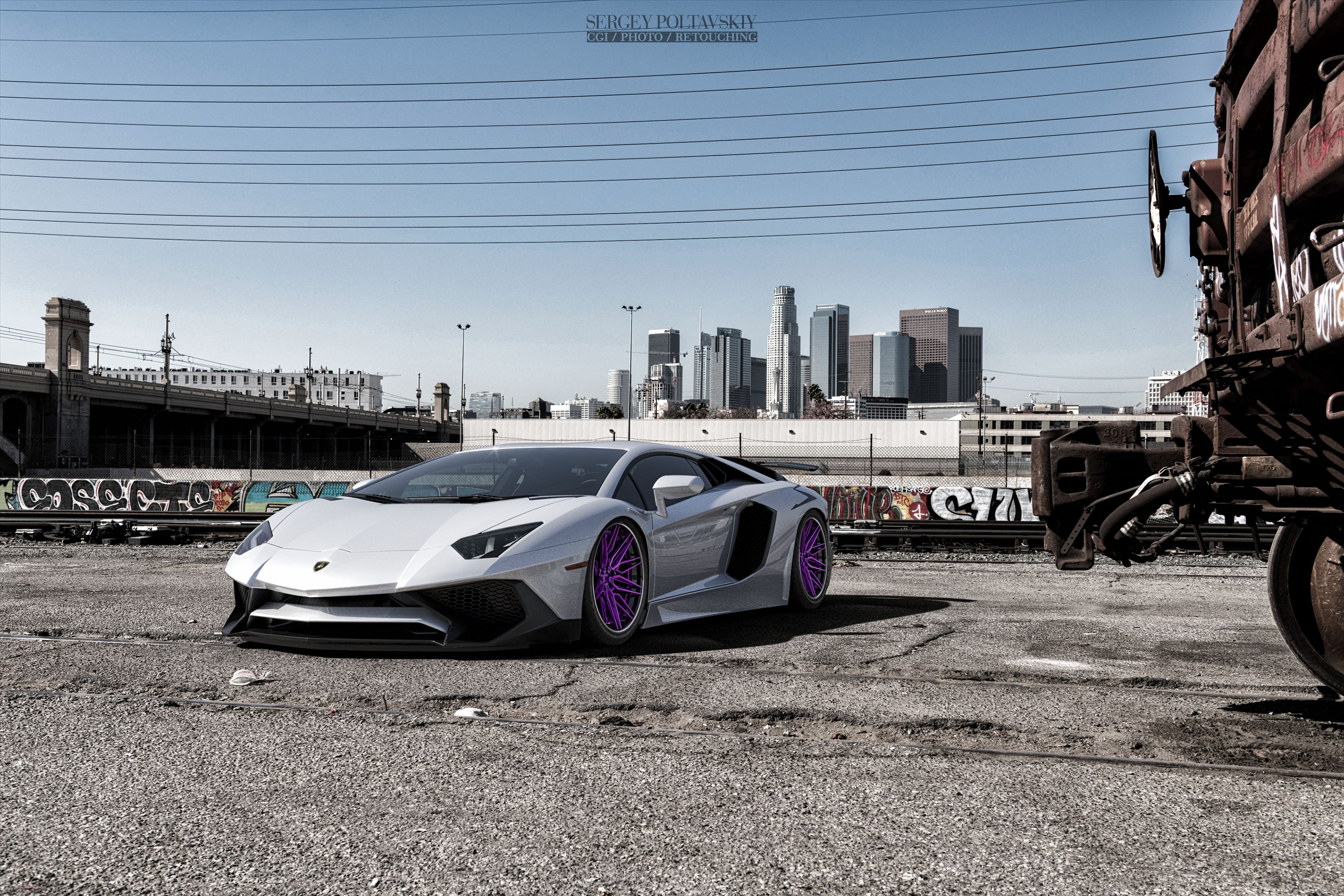 White Lamborghini on purple rims