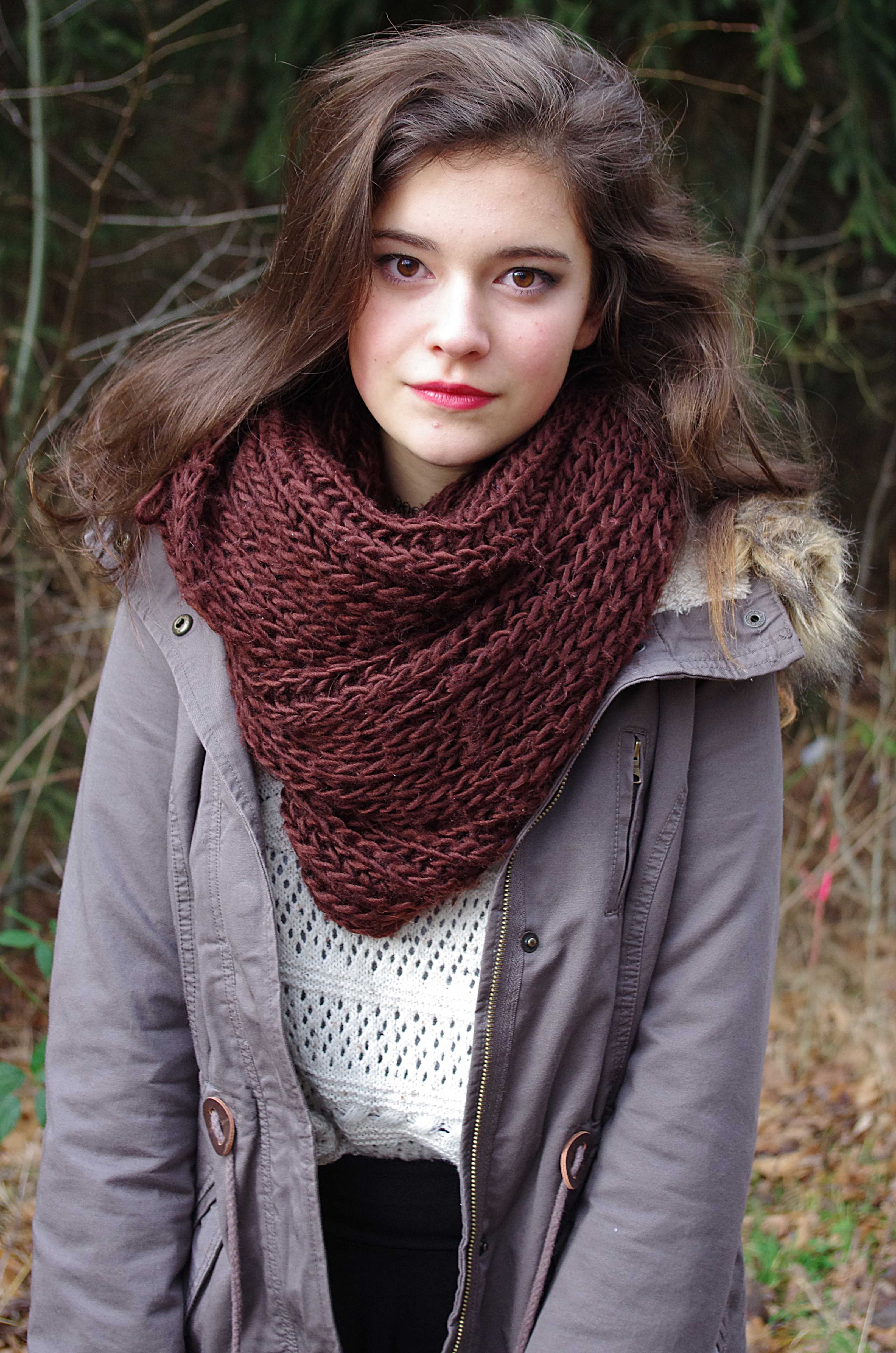 Dark-haired girl in a scarf