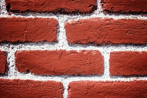 Red brick wall in close-up