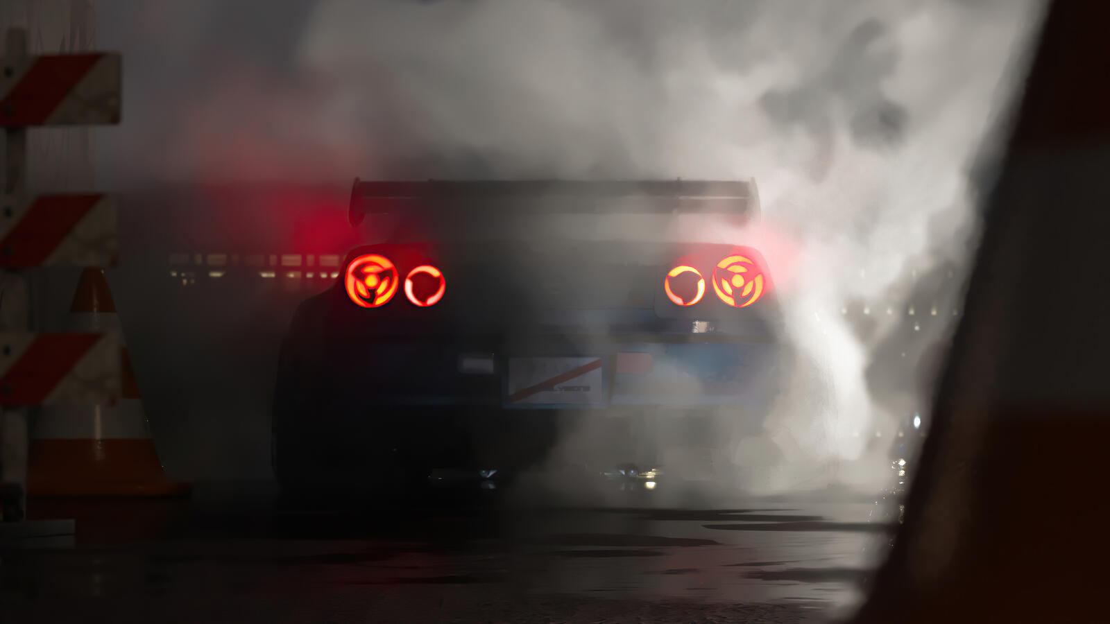 Бесплатное фото Задняя оптика Nissan Skyline в дыму