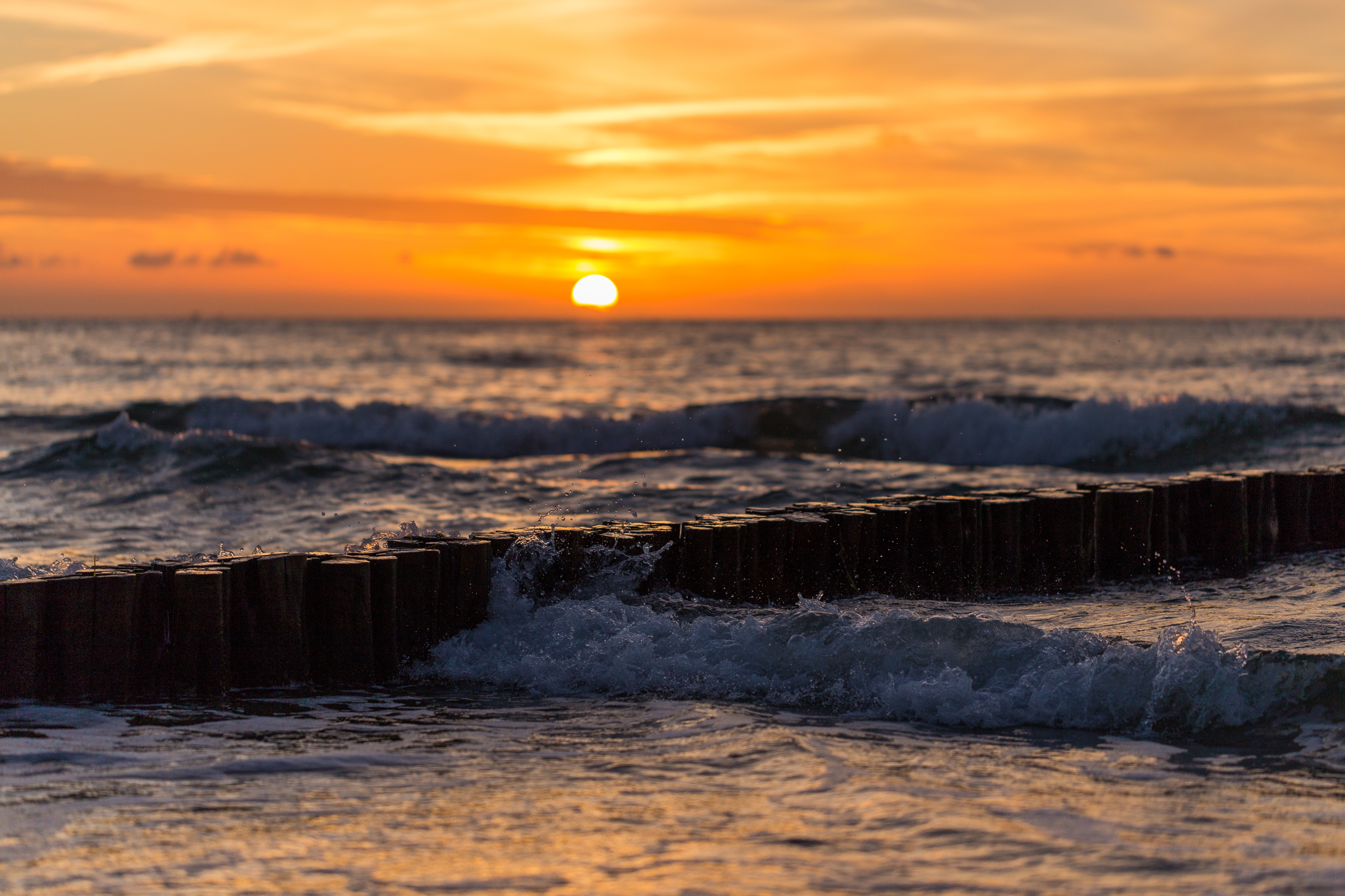 免费照片海岸边的夕阳