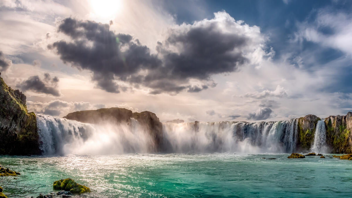 Panoramic waterfall with green water