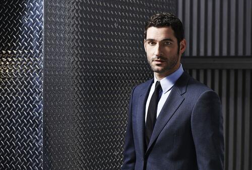 Lucifer in a strict office suit.