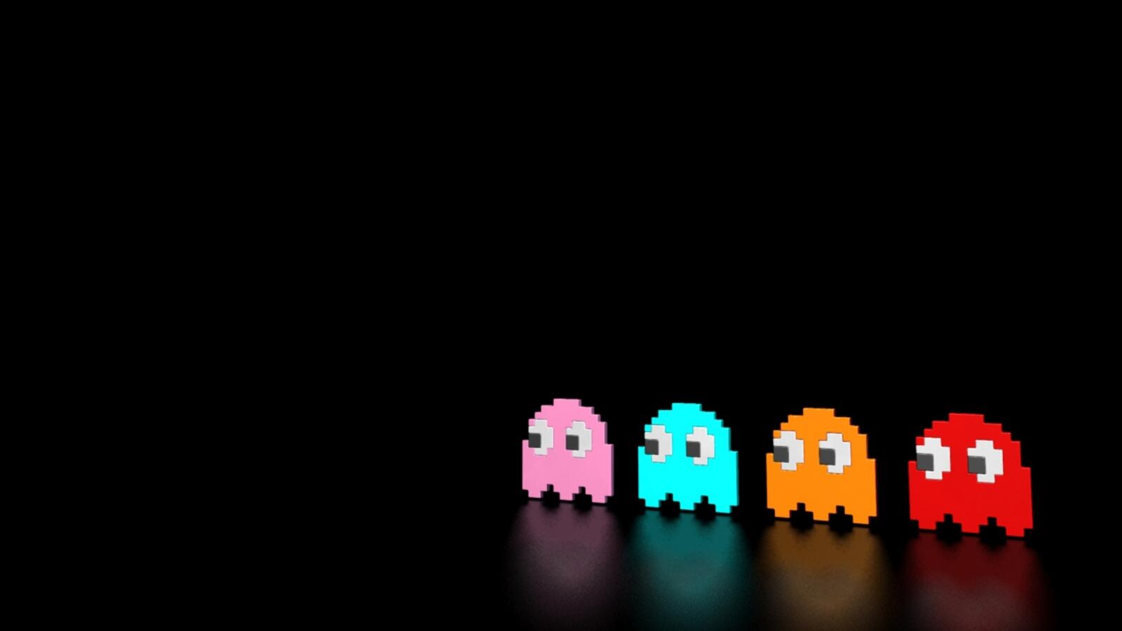 Free photo Colorful pixel ghosts on a black background
