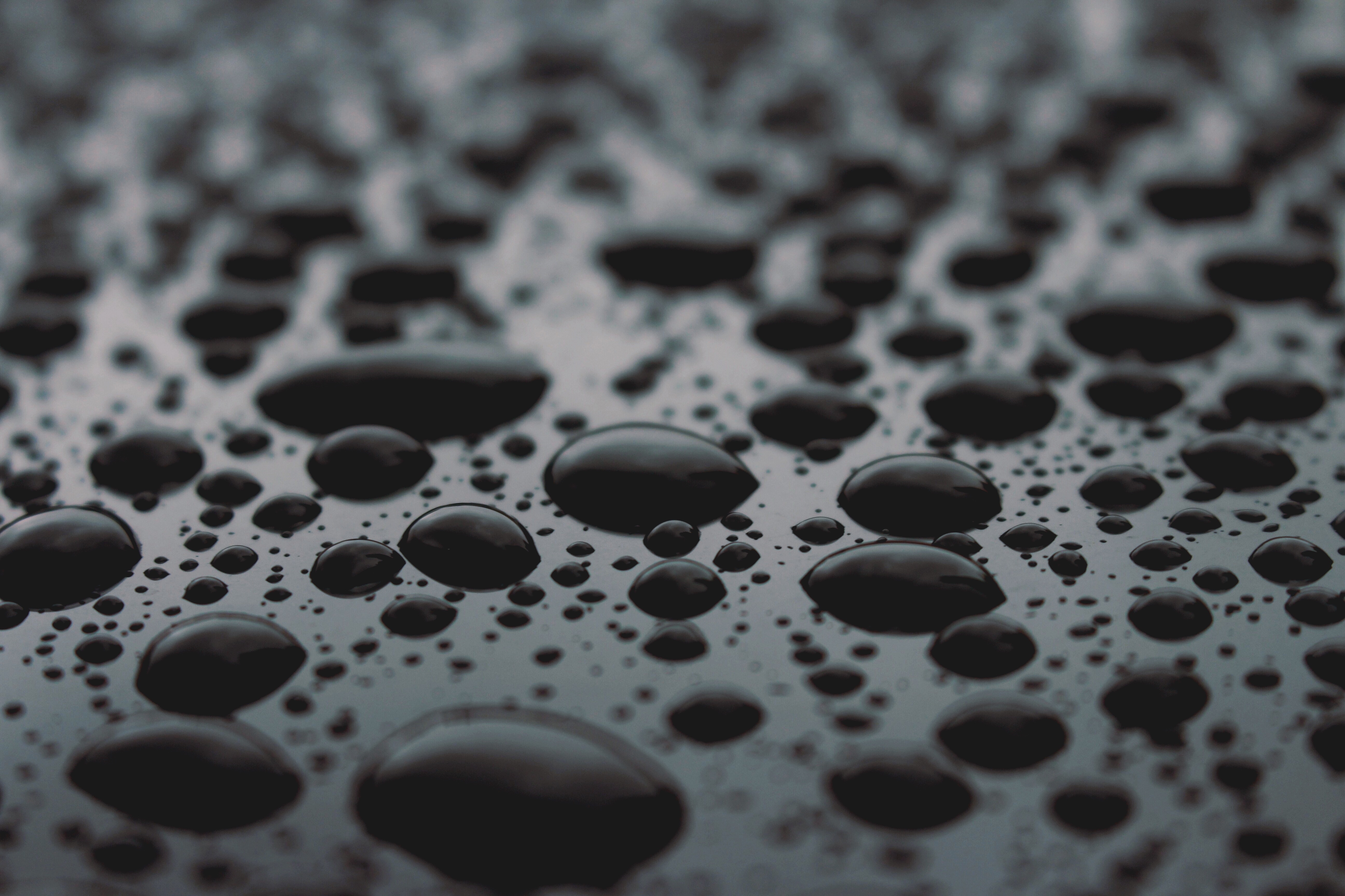 Wallpaper with water droplets on a glass surface