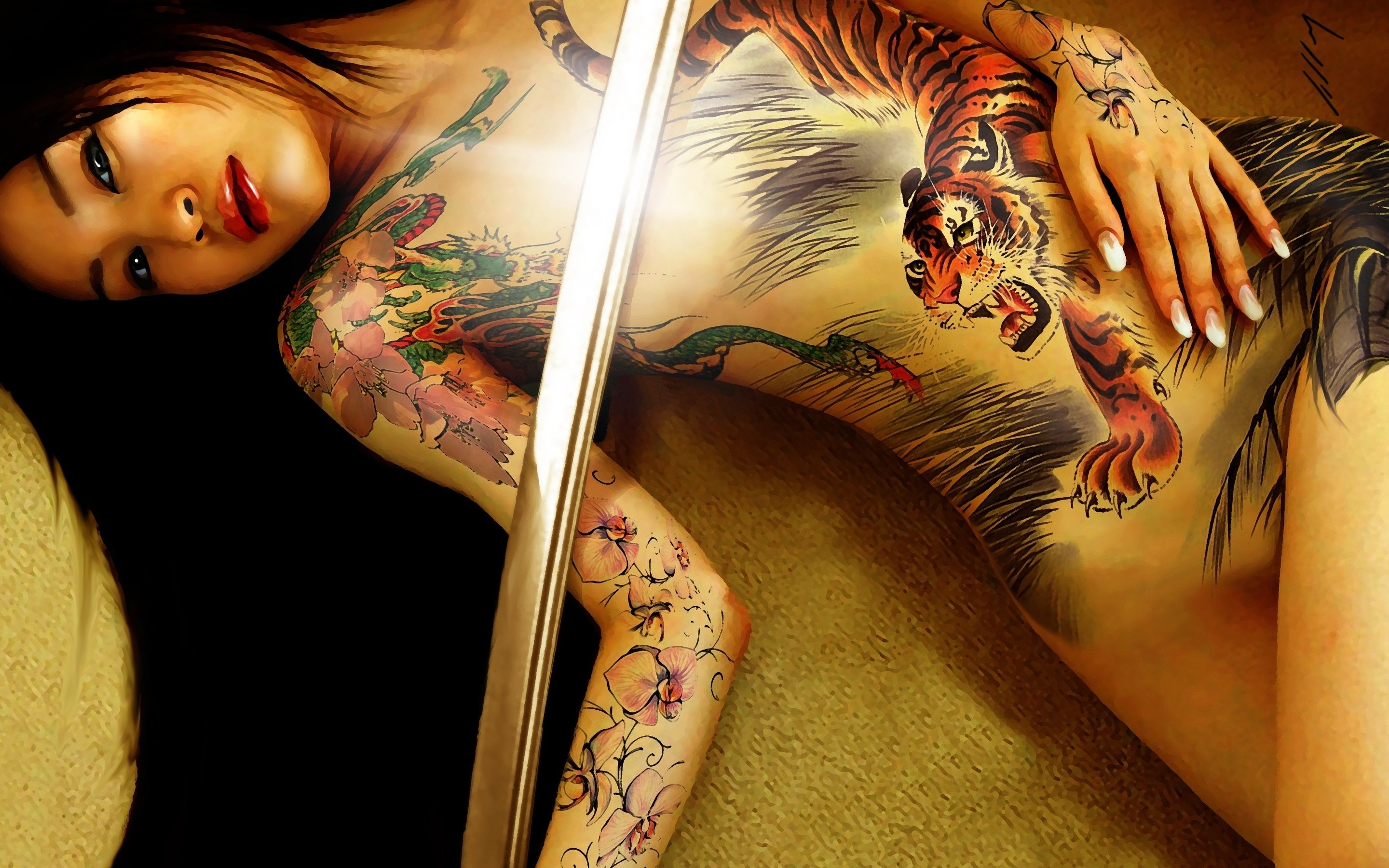 Free photo A girl with a beautiful tattoo all over her body