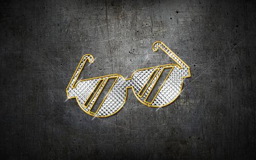Gold colored glasses with diamonds