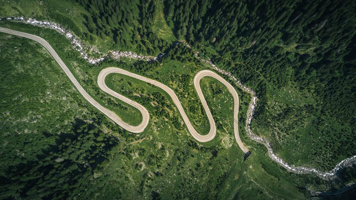 Winding road in the forest view from the quadcopter