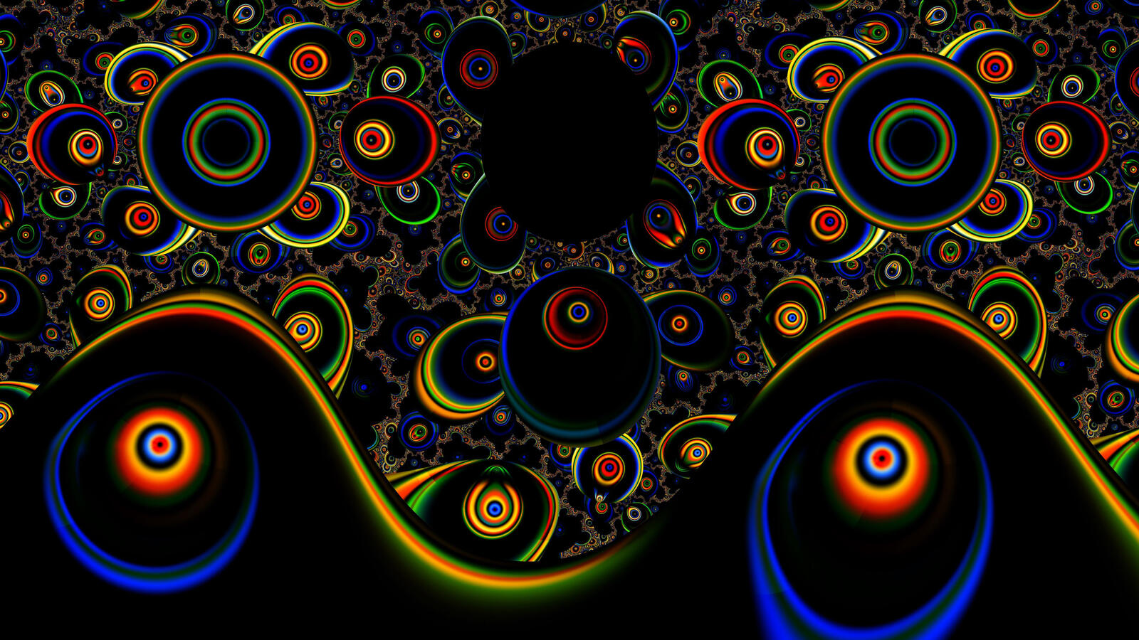 Бесплатное фото Разноцветные круги на черном фоне