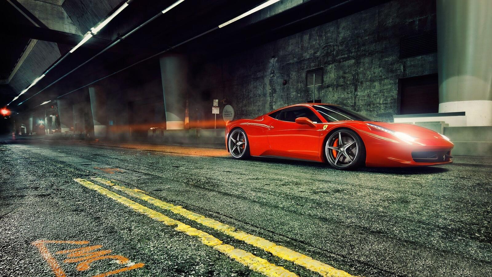 Free photo A red Ferrari 458 in the tunnels.