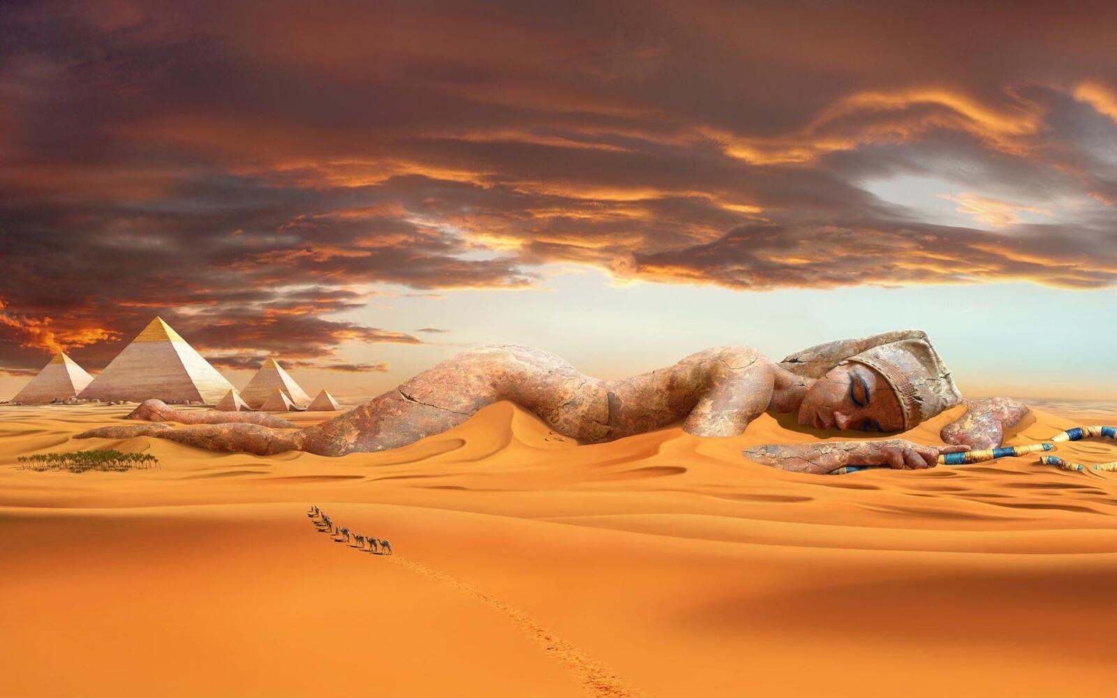 Бесплатное фото Египетская скульптура засыпанная песком