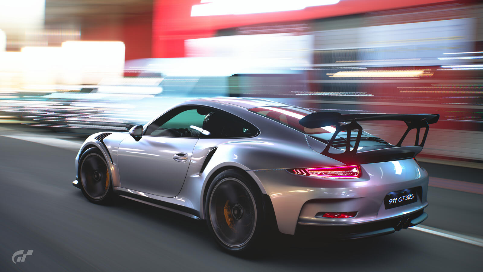 Бесплатное фото Porsche 911 вид сзади едет на большой скорости