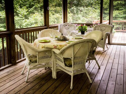 Summer kitchen on a wooden veranda