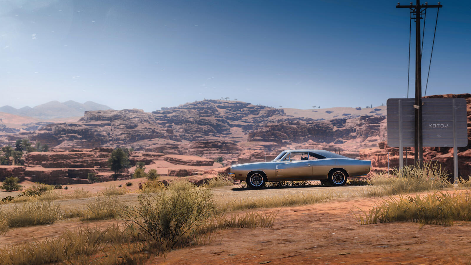 Бесплатное фото Dodge Charger на фоне американских гор