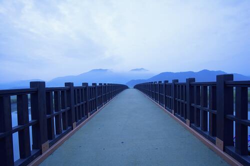 A long pier at sunset