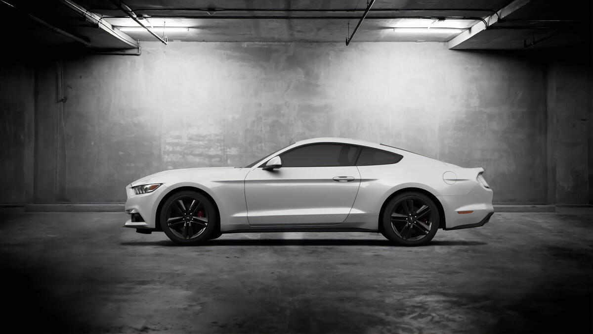White 2019 Ford Mustang in underground parking lot