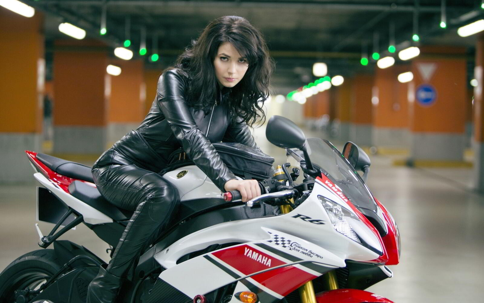 Free photo Brunette on a Yamaha sportbike