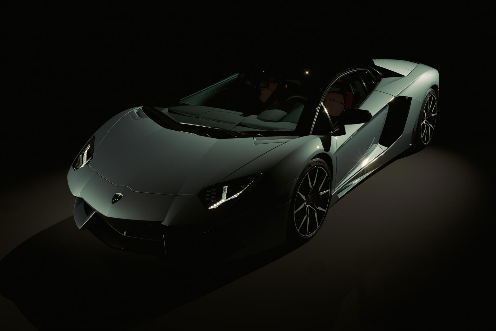 Free photo Lamborghini Aventador in a dark room.