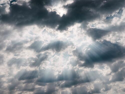Sunbeams from the thick clouds